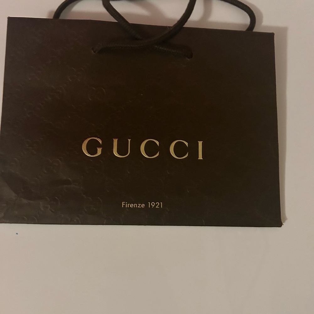 Brown Gucci shopping bag